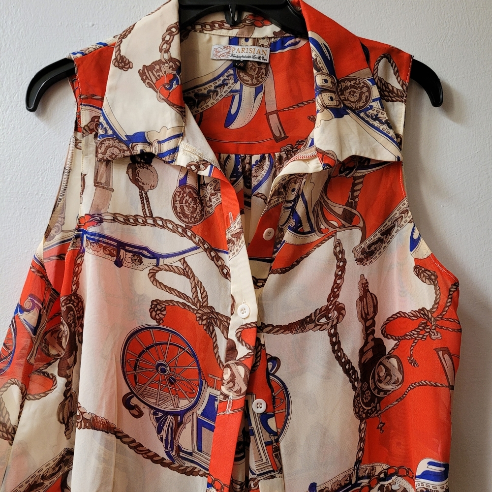 Size L - sleeveless multi-colored top which ties at the waist
